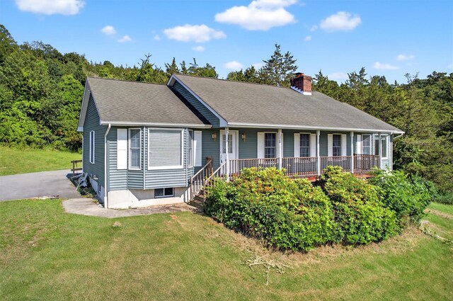 81 Hambletonian Rd, Chester, NY 10918 - ranch-style house with a chimney, a front yard, covered porch, and a shingled roof