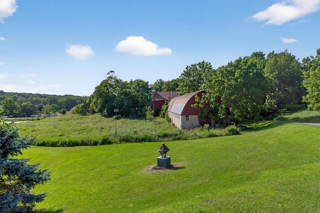 81 Hambletonian Rd, Chester, NY 10918 - view of grassy yard with a barn, an outbuilding, and a view of trees