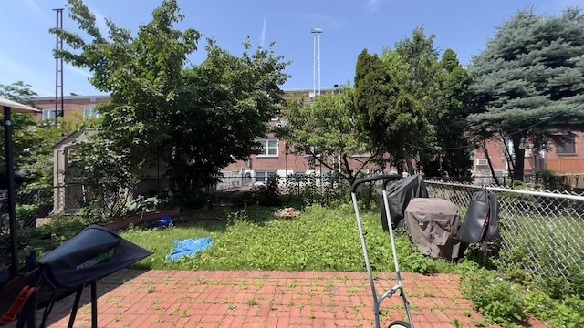 61-56 70th St, Middle Village, NY 11379 - view of yard featuring a patio area