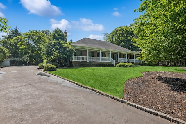4 Springview Ct, East Patchogue, NY 11772 - view of front facade with covered porch and a front lawn