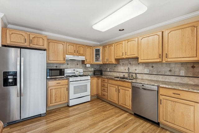 4 Springview Ct, East Patchogue, NY 11772 - kitchen with appliances with stainless steel finishes, under cabinet range hood, light brown cabinetry, ornamental molding, and light wood-type flooring