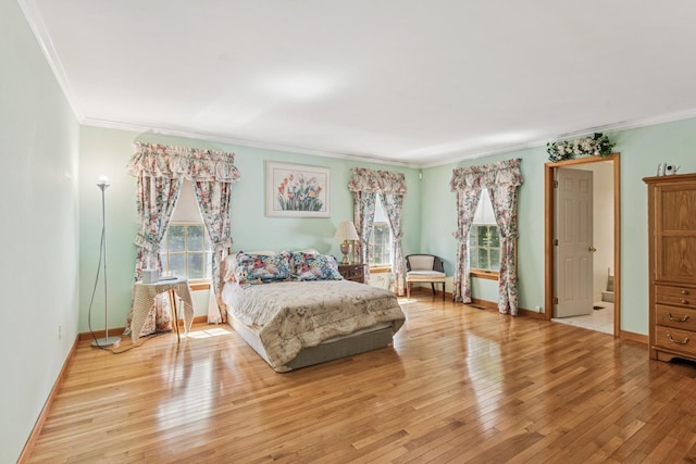 4 Springview Ct, East Patchogue, NY 11772 - bedroom with crown molding and hardwood / wood-style floors