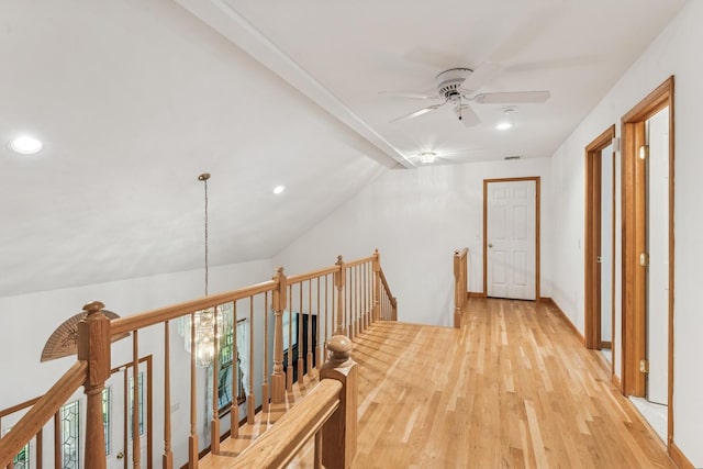 4 Springview Ct, East Patchogue, NY 11772 - hallway with an upstairs landing, recessed lighting, light wood-type flooring, and vaulted ceiling