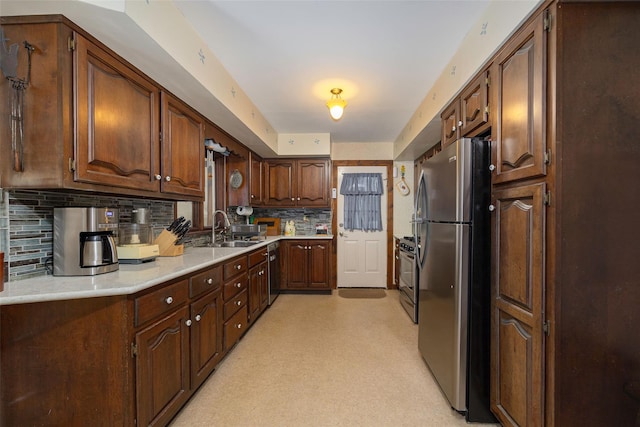 110 Read Rd, Red Hook, NY 12571 - kitchen featuring stainless steel appliances, tasteful backsplash, and light countertops