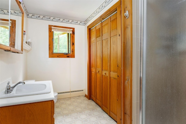 110 Read Rd, Red Hook, NY 12571 - full bathroom featuring baseboard heating, vanity, an enclosed shower, and a closet