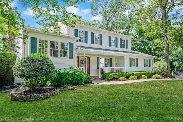 7 Simon Ct, East Northport, NY 11731 - view of front of property featuring covered porch and a front lawn