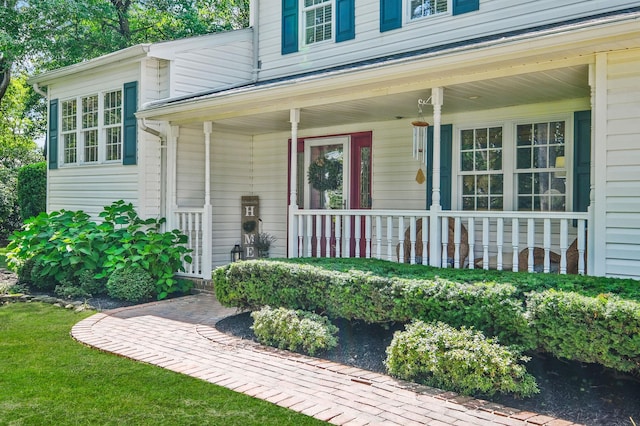 7 Simon Ct, East Northport, NY 11731 - entrance to property featuring a porch