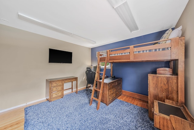 7 Simon Ct, East Northport, NY 11731 - bedroom featuring wood finished floors and baseboards