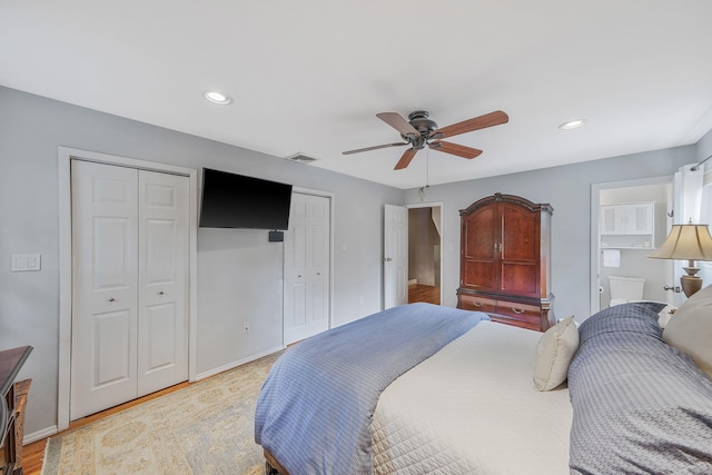 7 Simon Ct, East Northport, NY 11731 - bedroom featuring recessed lighting, multiple closets, light wood-type flooring, and ceiling fan
