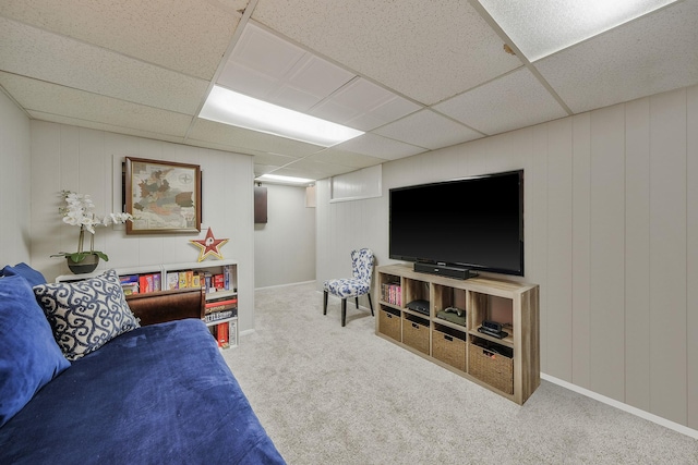 7 Simon Ct, East Northport, NY 11731 - carpeted living room featuring a paneled ceiling and a decorative wall
