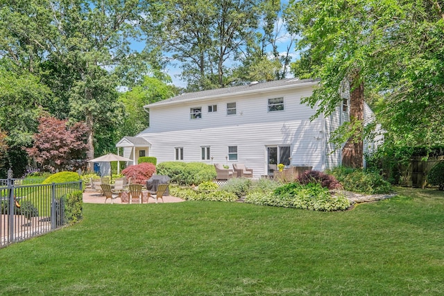 7 Simon Ct, East Northport, NY 11731 - back of house with a patio area and a chimney