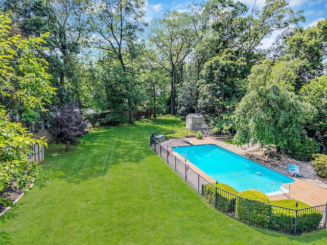 7 Simon Ct, East Northport, NY 11731 - view of pool with a fenced backyard and a shed