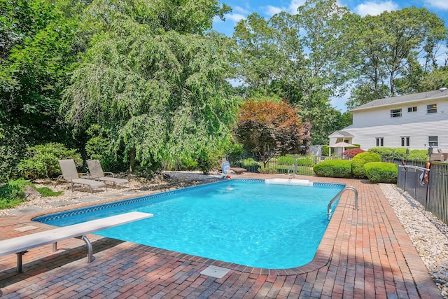 7 Simon Ct, East Northport, NY 11731 - view of swimming pool with a patio area and a diving board