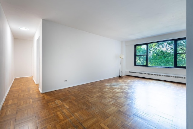 3850 Sedgwick Ave Unit 5B, Bronx, NY 10463 - empty room featuring a baseboard radiator and recessed lighting
