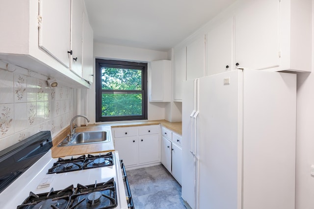 3850 Sedgwick Ave Unit 5B, Bronx, NY 10463 - kitchen featuring white appliances, white cabinets, and light countertops