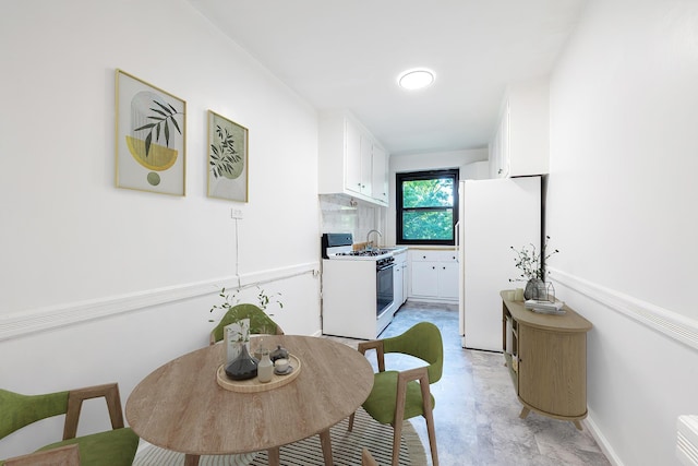3850 Sedgwick Ave Unit 5B, Bronx, NY 10463 - dining space with concrete flooring and baseboards