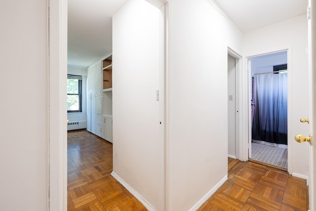 3850 Sedgwick Ave Unit 5B, Bronx, NY 10463 - hallway featuring a baseboard radiator and baseboards