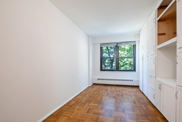 3850 Sedgwick Ave Unit 5B, Bronx, NY 10463 - spare room featuring radiator and baseboards