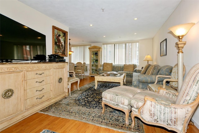 10 Canterbury Rd Apt 2G, Great Neck, NY 11021 - living room featuring light wood-type flooring and recessed lighting