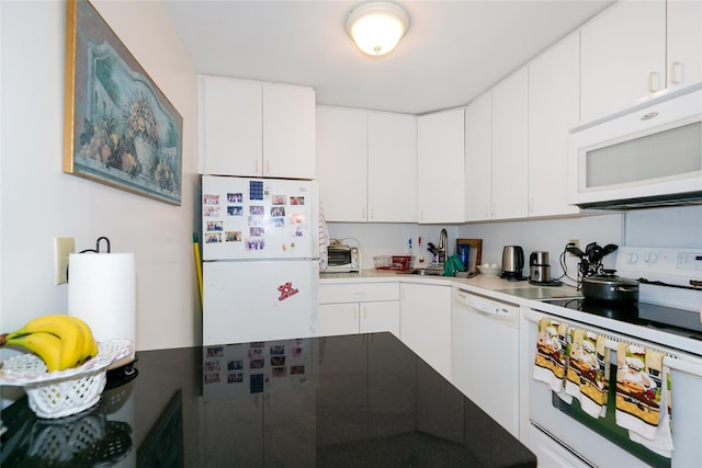 10 Canterbury Rd Apt 2G, Great Neck, NY 11021 - kitchen featuring white appliances and white cabinetry