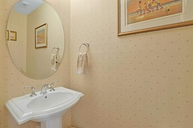 27 Bridge Ln, Haverstraw, NY 10927 - bathroom featuring a sink and wallpapered walls