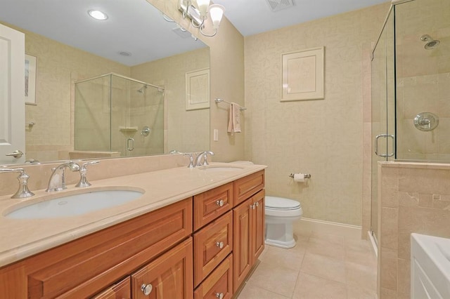 27 Bridge Ln, Haverstraw, NY 10927 - bathroom featuring tile patterned flooring, a stall shower, double vanity, and a bath