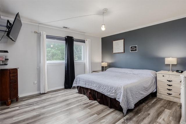 95 Pointe Cir S Unit 95, Coram, NY 11727 - bedroom featuring wood finished floors and baseboards