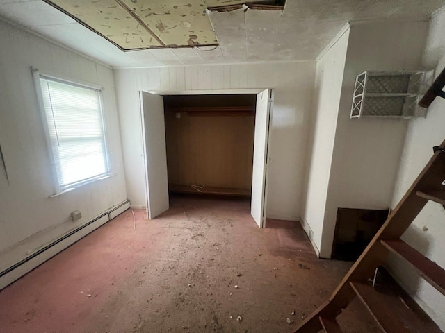 16 Bethlehem Pl, Poughkeepsie, NY 12603 - unfurnished bedroom featuring baseboard heating and a closet