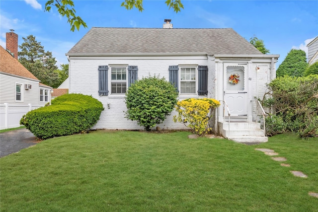68 Moore St, New Hyde Park, NY 11040 - cape cod home with brick siding, a chimney, and a shingled roof