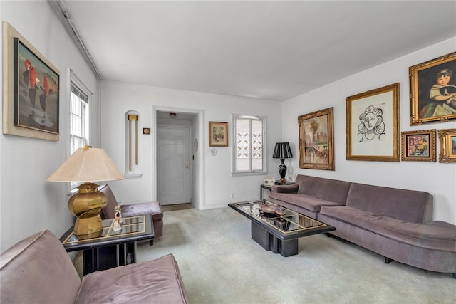 68 Moore St, New Hyde Park, NY 11040 - carpeted living area featuring healthy amount of natural light