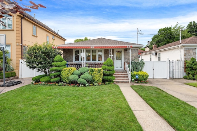 91-23 156th Ave, Howard Beach, NY 11414 - view of front of house with a gate, stone siding, and a porch