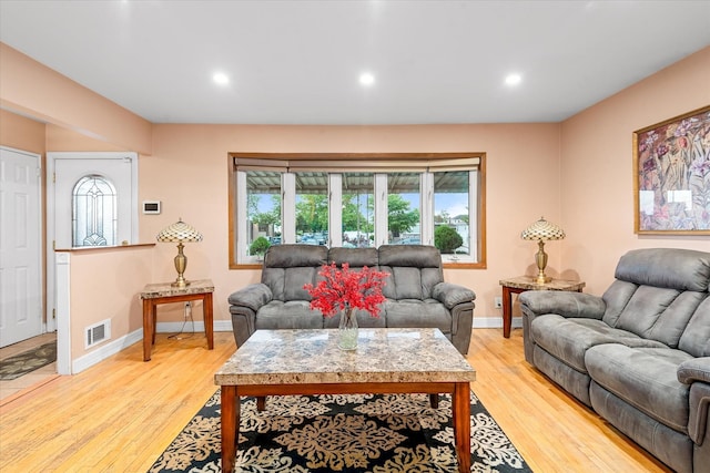 91-23 156th Ave, Howard Beach, NY 11414 - living room with light wood-style floors and recessed lighting