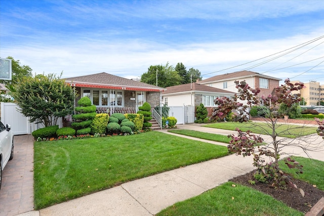 91-23 156th Ave, Howard Beach, NY 11414 - view of front of home with a gate