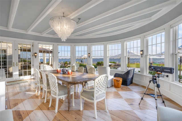 59 Shore Rd, Westhampton, NY 11977 - sunroom / solarium featuring french doors, healthy amount of natural light, a chandelier, and beamed ceiling