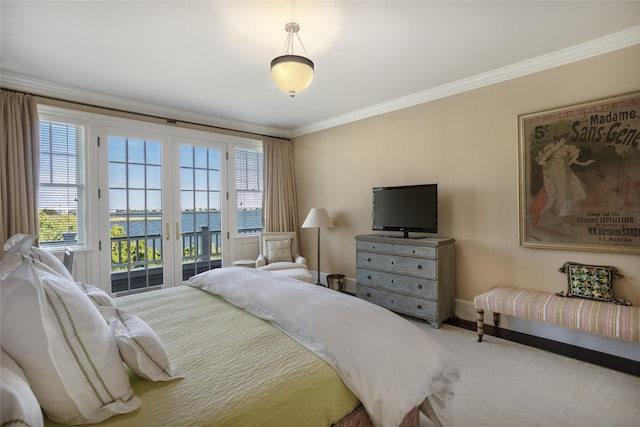 59 Shore Rd, Westhampton, NY 11977 - bedroom featuring french doors, access to exterior, crown molding, multiple windows, and carpet