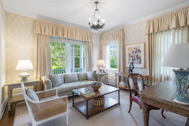 59 Shore Rd, Westhampton, NY 11977 - living area featuring wallpapered walls, a chandelier, wood finished floors, and ornamental molding