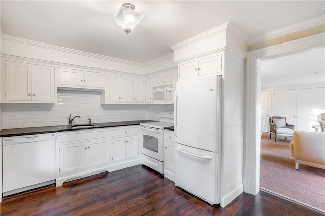 59 Shore Rd, Westhampton, NY 11977 - kitchen with white appliances, dark countertops, white cabinetry, tasteful backsplash, and dark wood finished floors