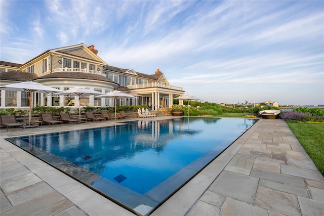 59 Shore Rd, Westhampton, NY 11977 - view of pool featuring an infinity pool and a patio area