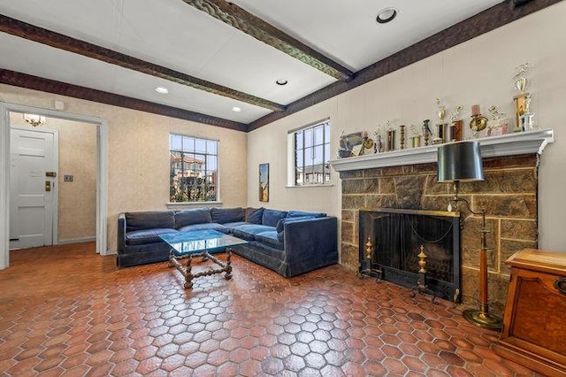 7318 180th St, Fresh Meadows, NY 11366 - living area featuring beam ceiling and a stone fireplace