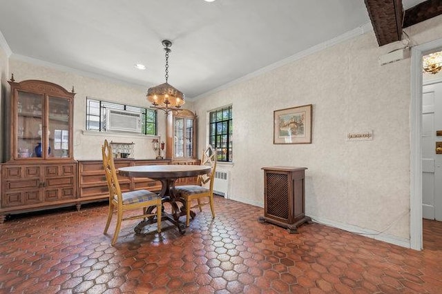 7318 180th St, Fresh Meadows, NY 11366 - dining room featuring radiator heating unit, crown molding, and a chandelier