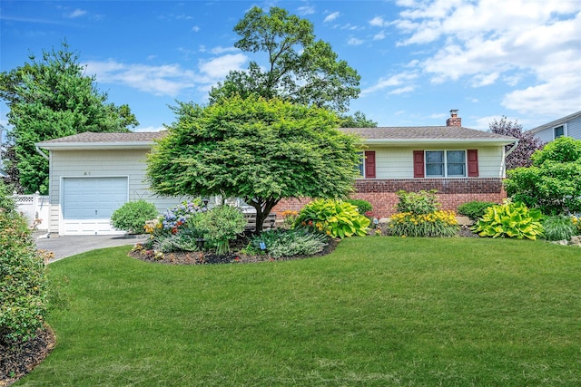 41 W 21st St, Deer Park, NY 11729 - view of front of property with an attached garage, a chimney, a front yard, asphalt driveway, and brick siding