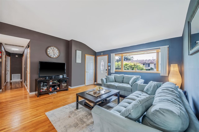 41 W 21st St, Deer Park, NY 11729 - living area with light wood finished floors and vaulted ceiling