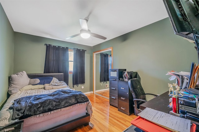41 W 21st St, Deer Park, NY 11729 - bedroom featuring light wood-style floors, an office area, ceiling fan, and a closet