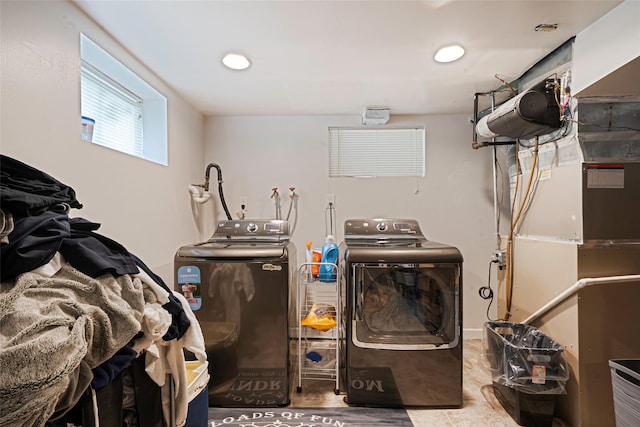 41 W 21st St, Deer Park, NY 11729 - washroom with separate washer and dryer, heating unit, and recessed lighting