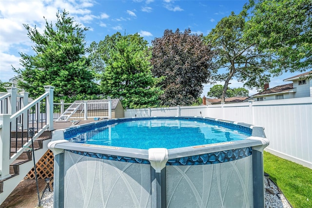 41 W 21st St, Deer Park, NY 11729 - view of pool with a fenced backyard, stairs, and a wooden deck