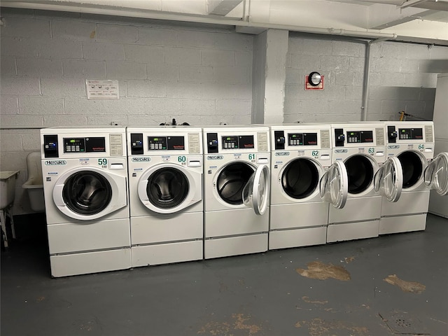 29 Abeel St Unit 6G, Yonkers, NY 10705 - shared laundry room featuring independent washer and dryer and concrete block wall