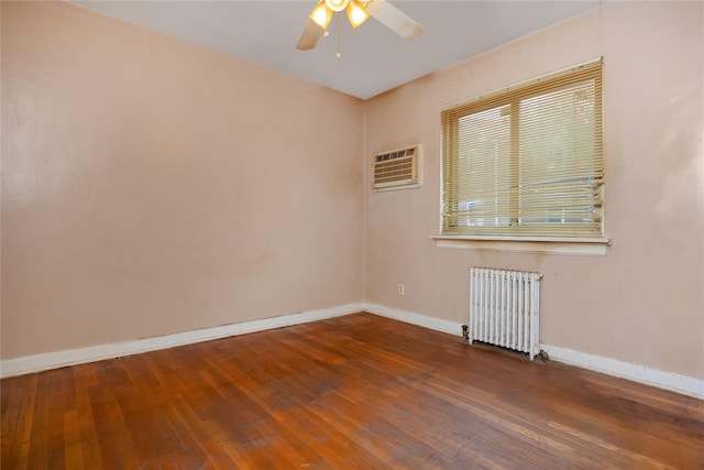 75-06A 255th St Unit A, Glen Oaks, NY 11004 - unfurnished room with radiator, a wall mounted AC, a ceiling fan, and wood-type flooring