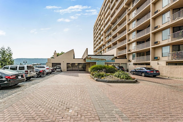 1155 Warburton Ave Unit 1H, Yonkers, NY 10701 - view of property featuring uncovered parking