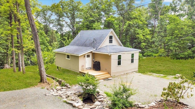 8 Pioneer Trl, Monroe, NY 10950 - view of front of house with a front lawn and roof with shingles