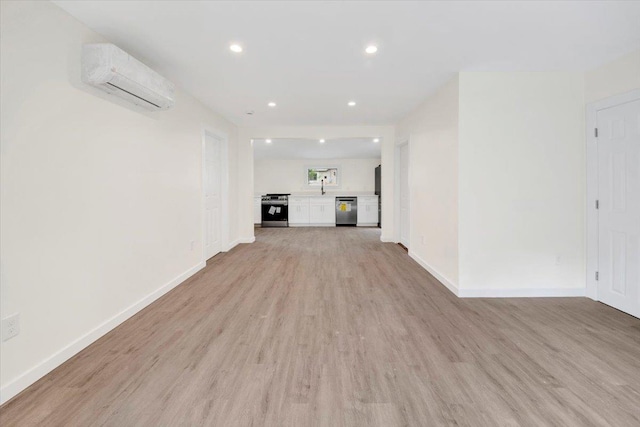 8 Pioneer Trl, Monroe, NY 10950 - unfurnished living room with a wall mounted AC, light wood-style floors, and recessed lighting